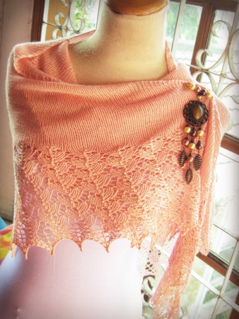 Ishbel shawl finally done! the brooch was made by my sister the beads crafter :)